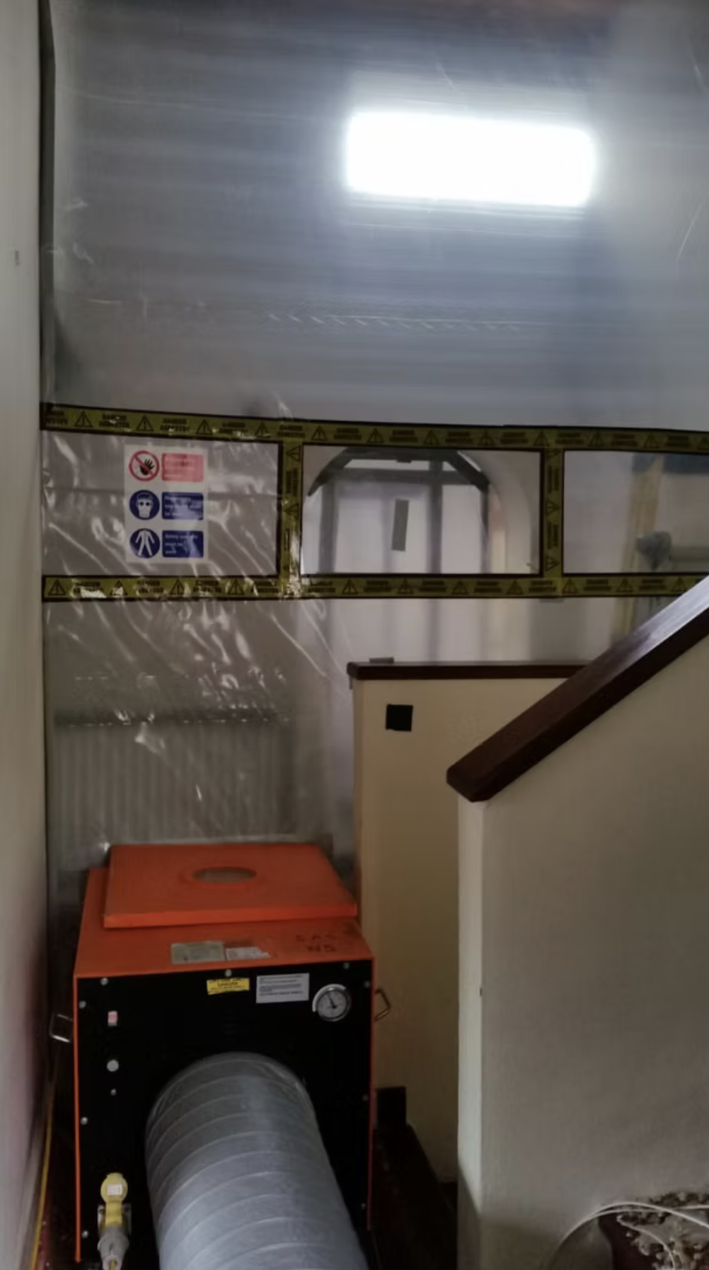 Asbestos enclosureArtex ceilingEnclosure for removal of artex ceiling with negative air pressure unit.