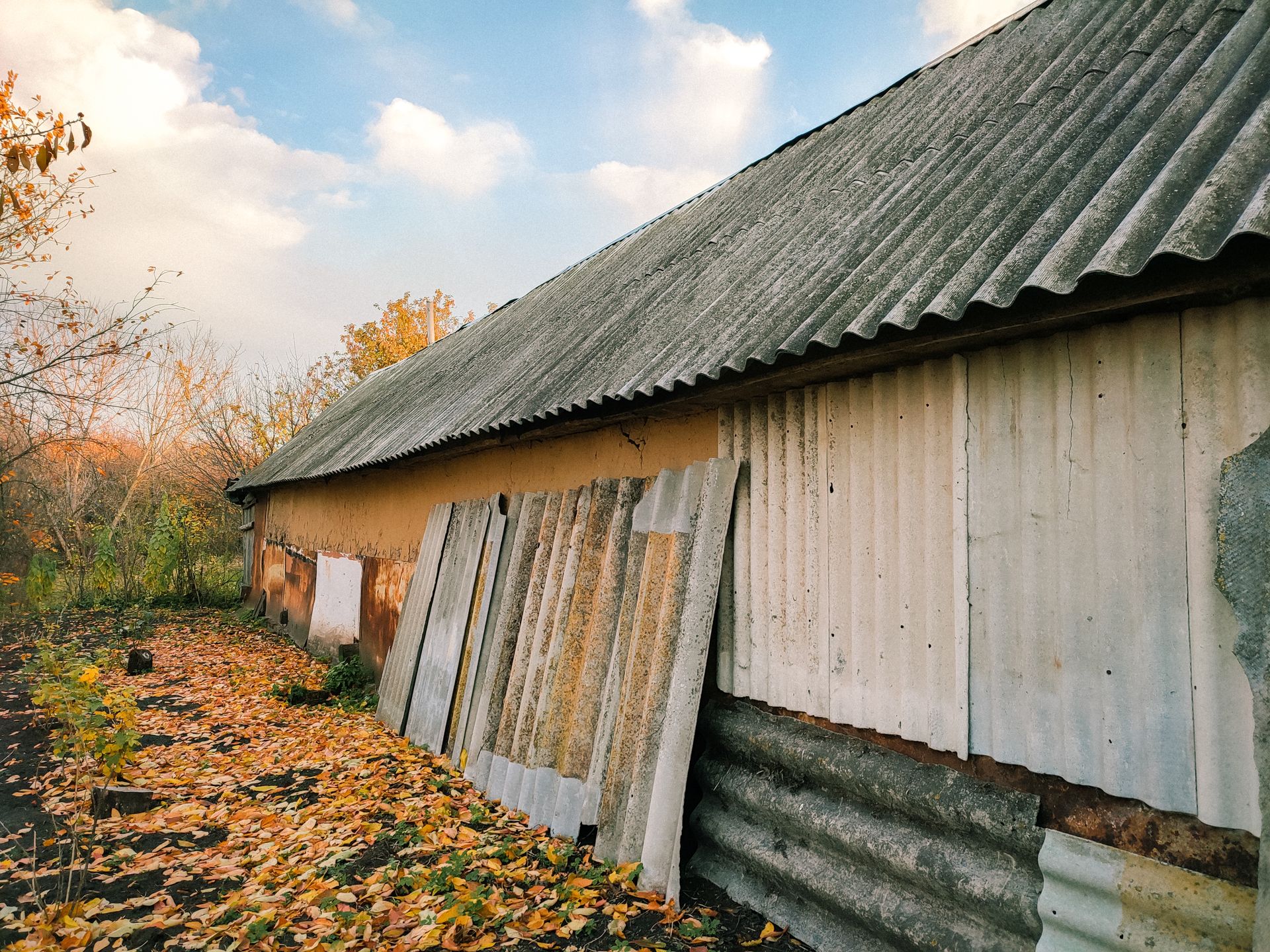 Weathered corrugated garage roof sheets, a common reason for asbestos removal in Camberley